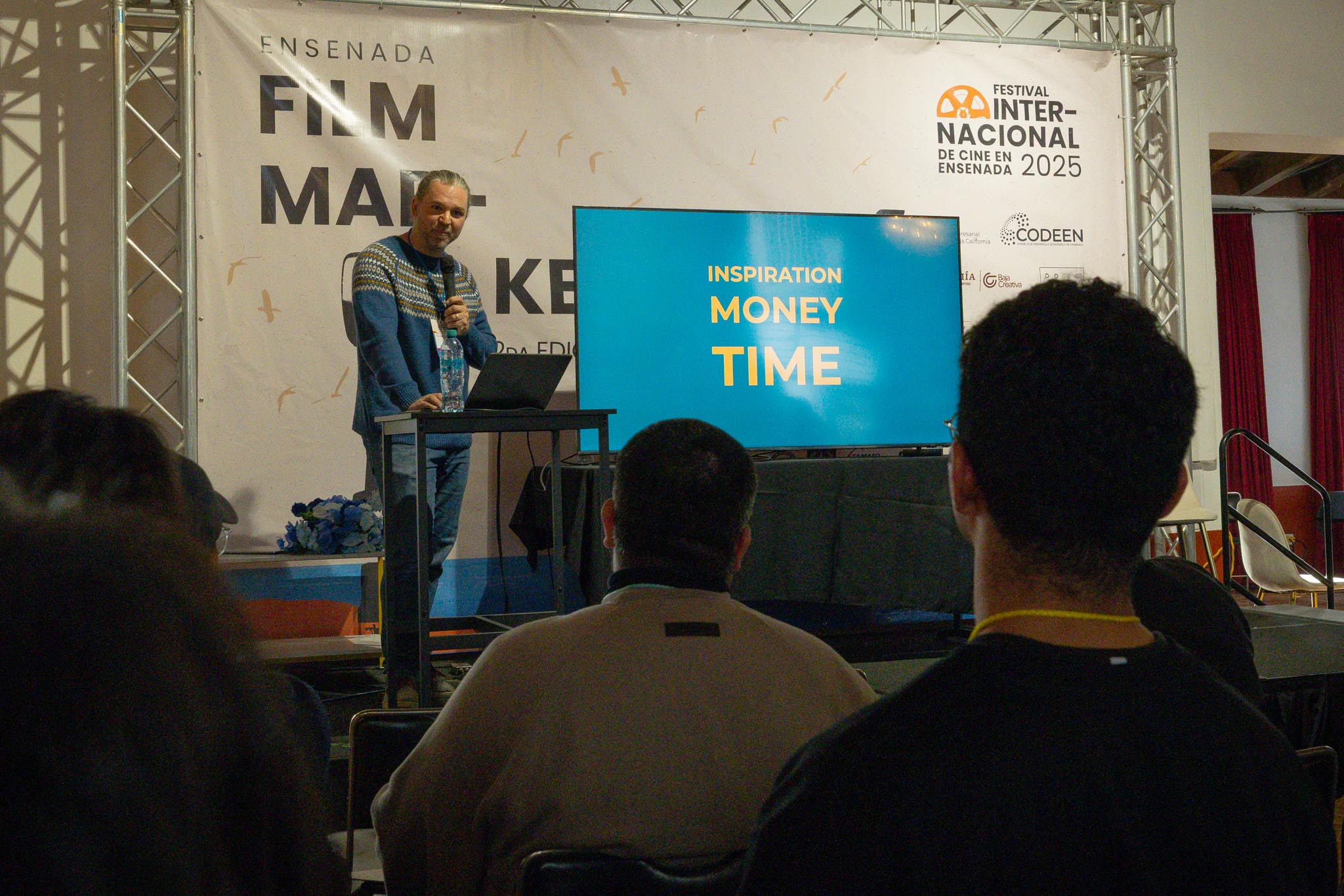 Ola Martin Fjeld presenting about the limitations that come during a film production.