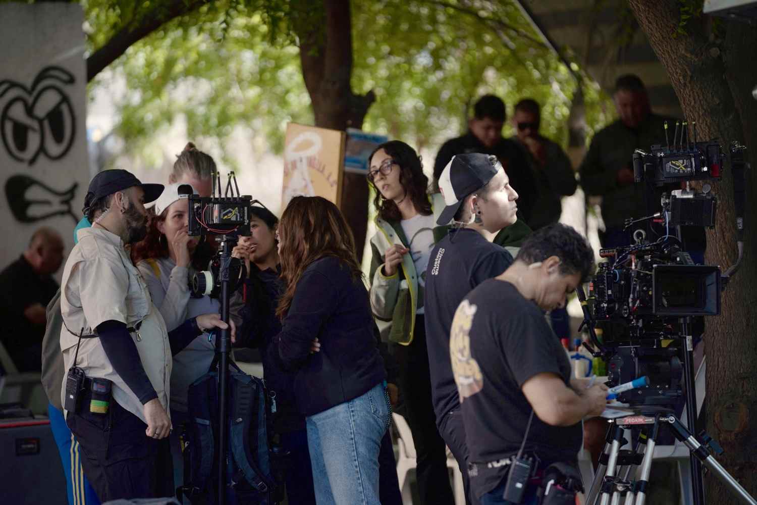 Many people using the film equipment for a shoot in La Paz